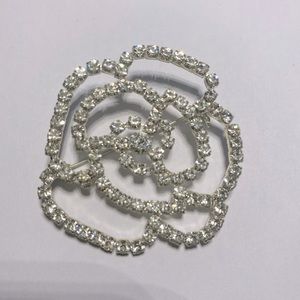 Silver and crystal flower brooch